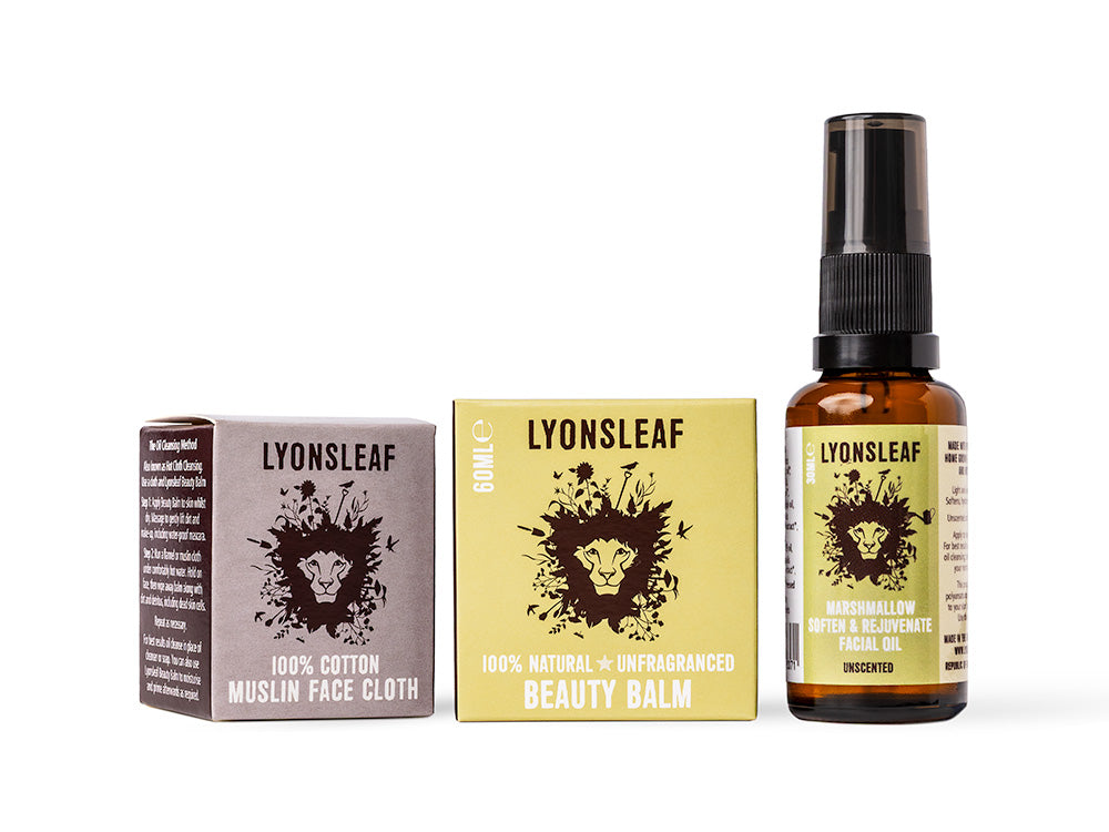 LYONSLEAF Night & day unfragranced skincare gift bundle products including a muslin cloth, Beauty balm, and Marshmallow facial oil bottle on a white background