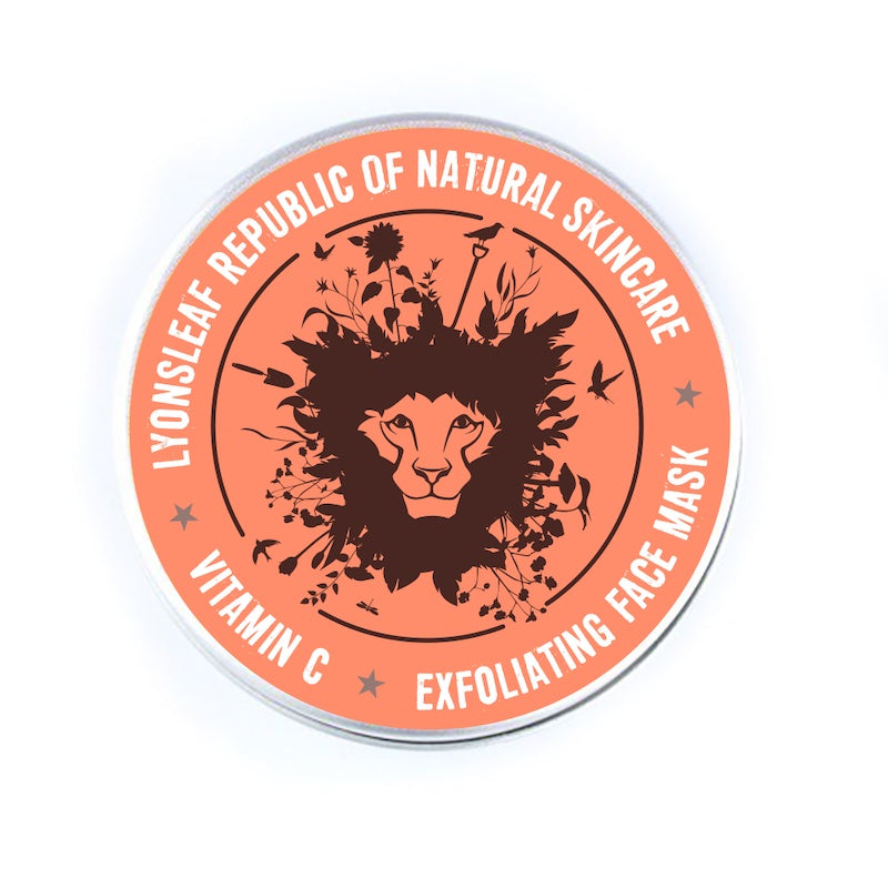 Round face mask container with a lion design and text on an orange background