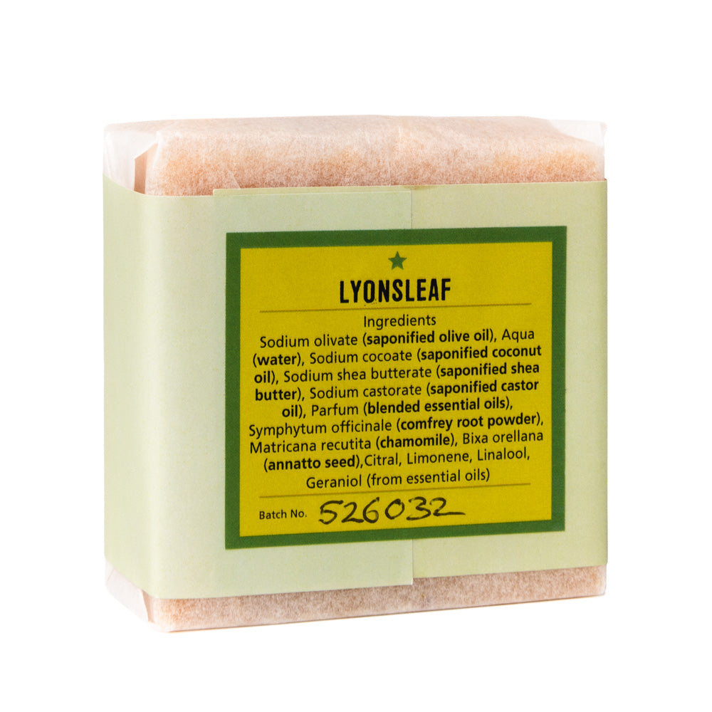 Bar of citrus and rosemary soap with Lyonsleaf branding and ingredient list on a white background